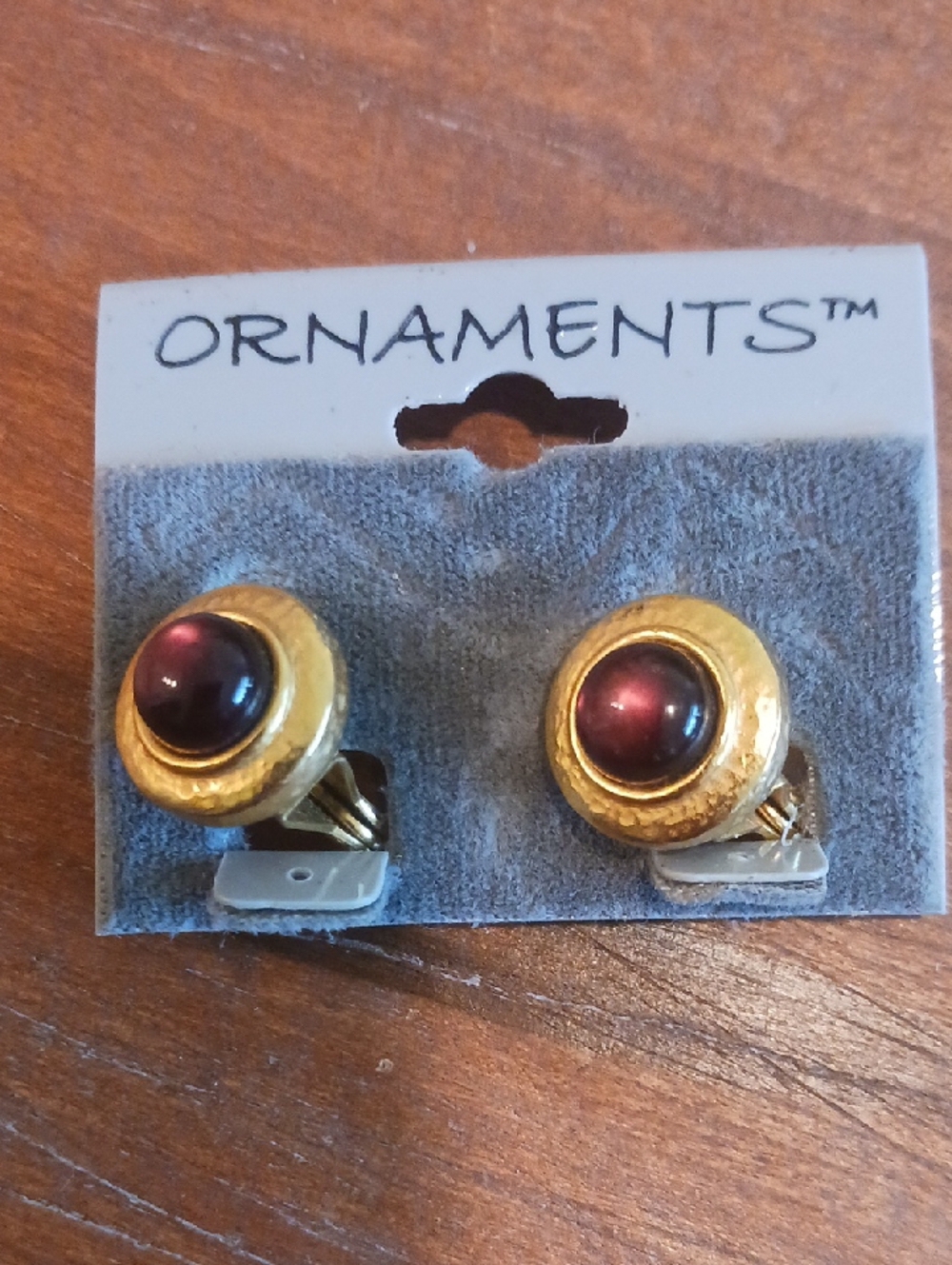 Gold Clip-On Earrings with Purple Cabochons